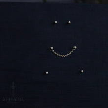 Load image into Gallery viewer, Solid yellow gold diamond cut chain displayed on a black background